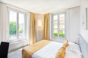 Hôtel Alpes et Lac Neuchâtel – Chambre vue gare