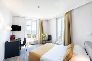 Hôtel Alpes et Lac Neuchâtel – Chambre vue lac