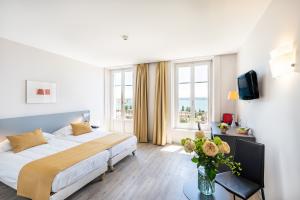 Hôtel Alpes et Lac Neuchâtel – Chambre vue lac