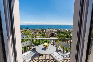 Hôtel Alpes et Lac Neuchâtel – Chambre avec balcon vue lac